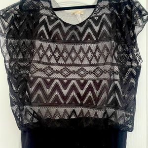 Black short sleeve patterned women’s shirt
